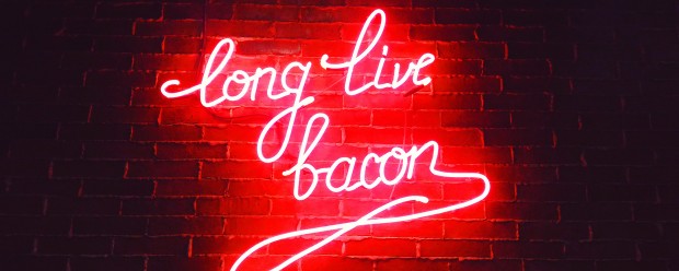Long live bacon – red neon on a brick wall