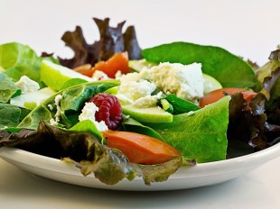 Fresh green spinach salad with cheese